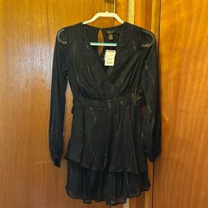 Japna Black long sleeve Dress with ruffle skirt.